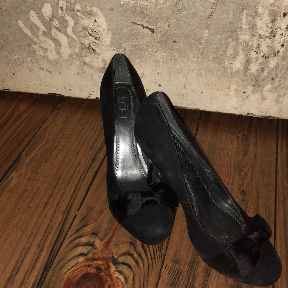 Black suede pumps